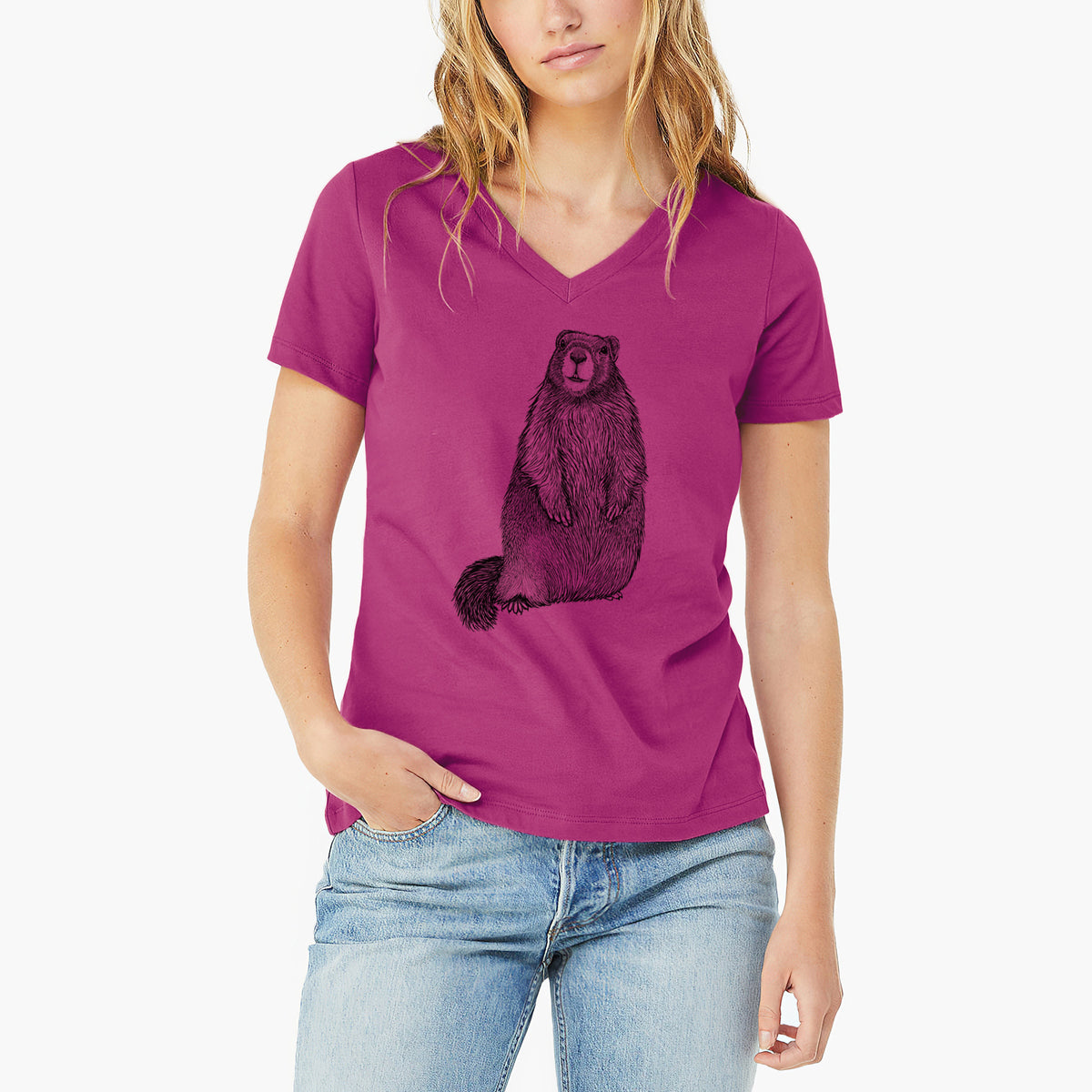 Woman wearing a berry pink women's relaxed fit cotton V-neck t-shirt printed with a detailed black ink illustration of a marmot standing upright.