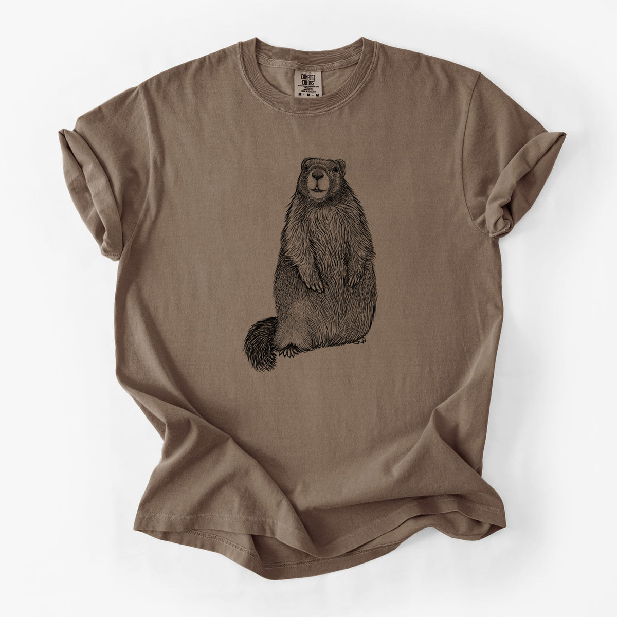 Espresso brown Comfort Colors t-shirt laid flat, printed with a detailed black ink illustration of a marmot standing upright.