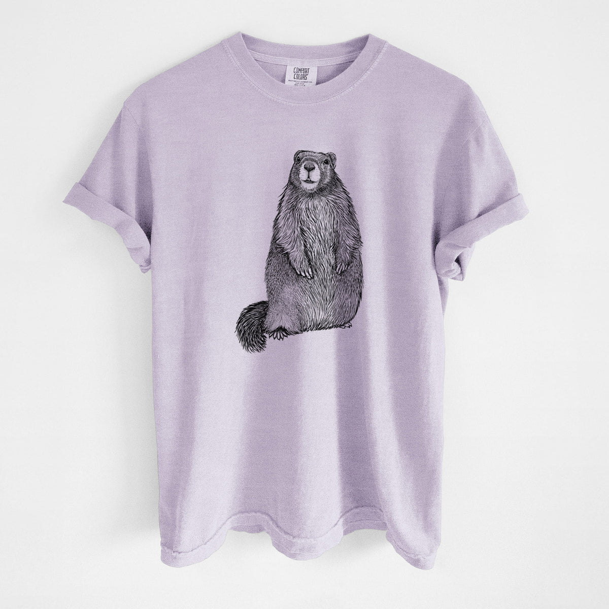 Orchid purple Comfort Colors t-shirt laid flat, printed with a detailed black ink illustration of a marmot standing upright.