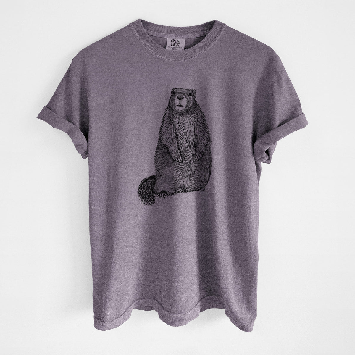 Wine red Comfort Colors t-shirt laid flat, printed with a detailed black ink illustration of a marmot standing upright.