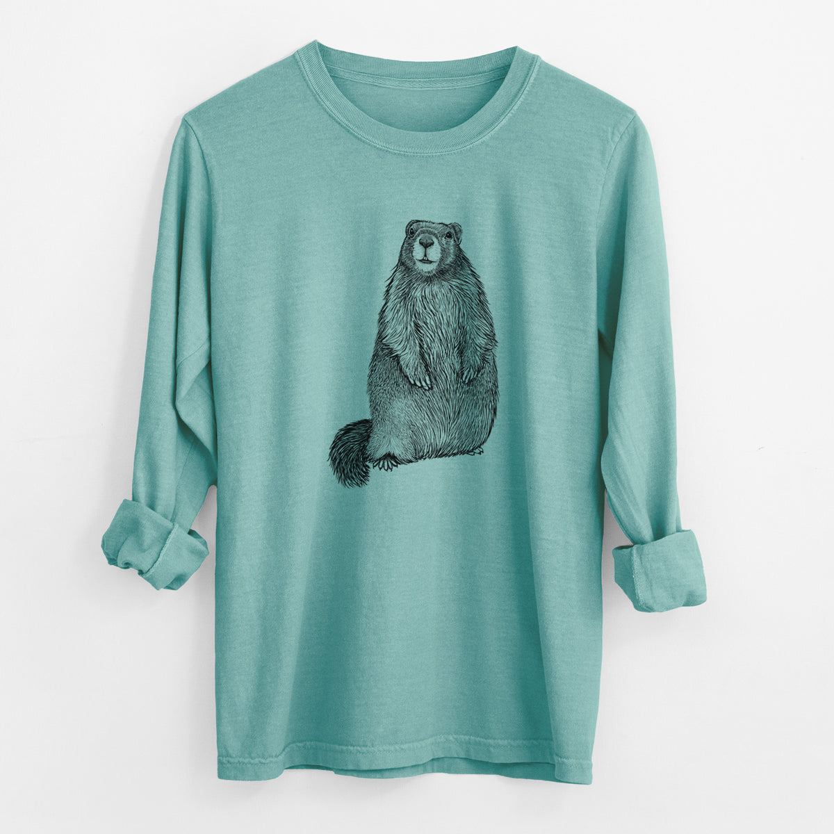 Reef green Comfort Colors long sleeve shirt laid flat with the cuffs rolled, printed with a detailed black ink illustration of a marmot standing upright.