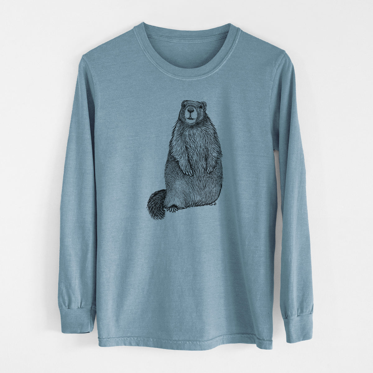 Steel blue Comfort Colors long sleeve shirt laid flat, printed with a detailed black ink illustration of a marmot standing upright.