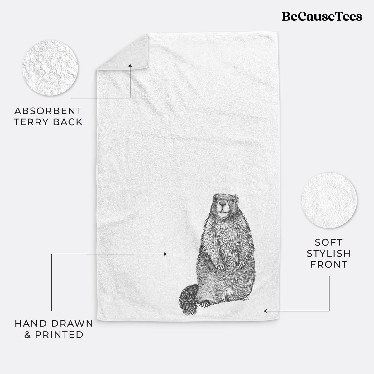 White hand towel printed with a detailed black ink illustration of a marmot standing upright.