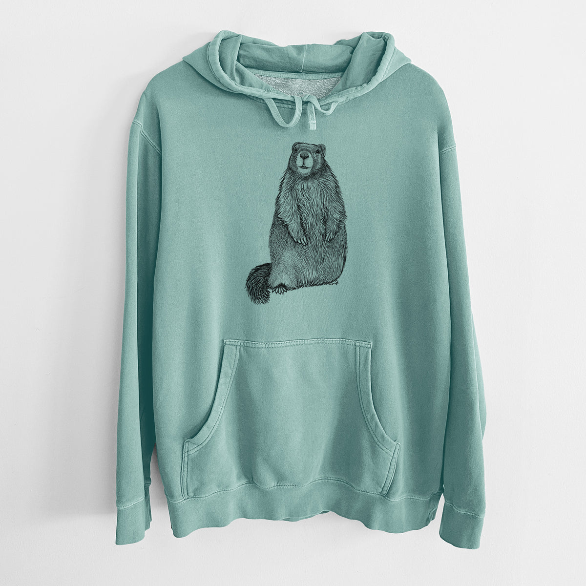 Mint green pigment dyed hoodie laid flat, printed with a detailed black ink illustration of a marmot standing upright.