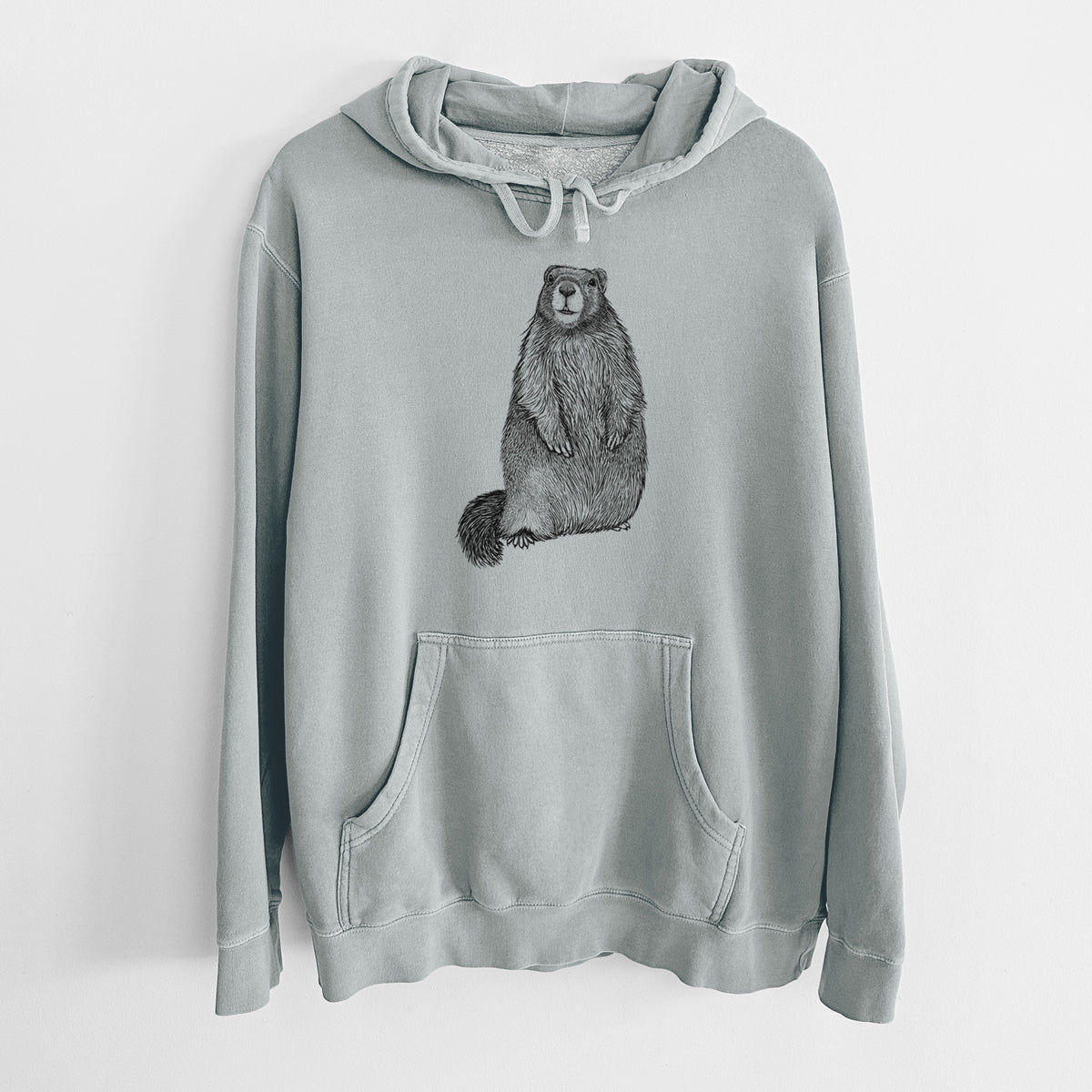 Sage green pigment dyed hoodie laid flat, printed with a detailed black ink illustration of a marmot standing upright.