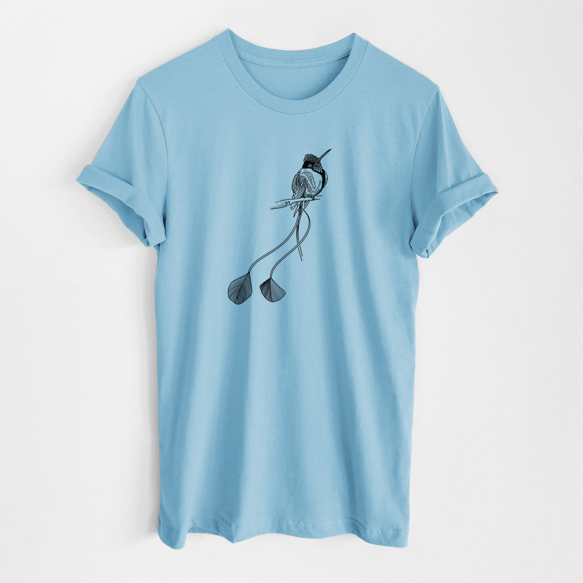 Ocean blue lightweight cotton t-shirt laid flat, printed with a black ink illustration of a marvelous spatuletail hummingbird perched, with its two long racket-tipped tail feathers.