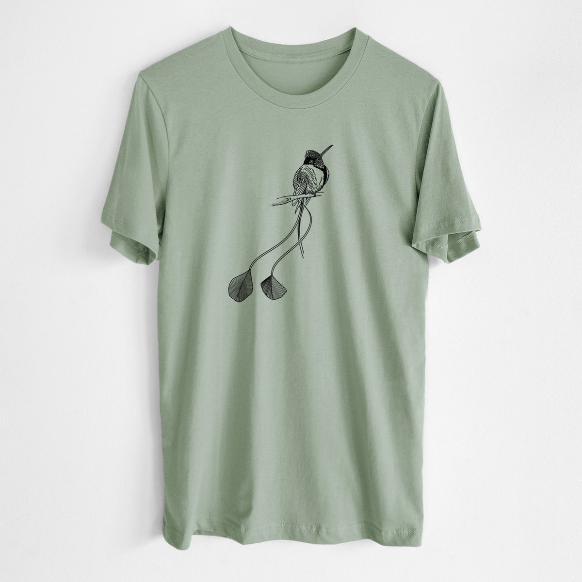 Sage green lightweight cotton t-shirt laid flat, printed with a black ink illustration of a marvelous spatuletail hummingbird perched, with its two long racket-tipped tail feathers.