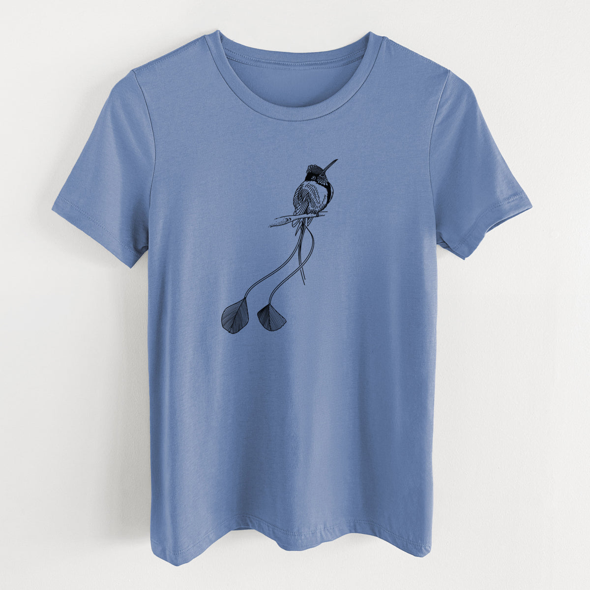 Blue bell women's relaxed fit cotton t-shirt laid flat, printed with a black ink illustration of a marvelous spatuletail hummingbird perched, with its two long racket-tipped tail feathers.