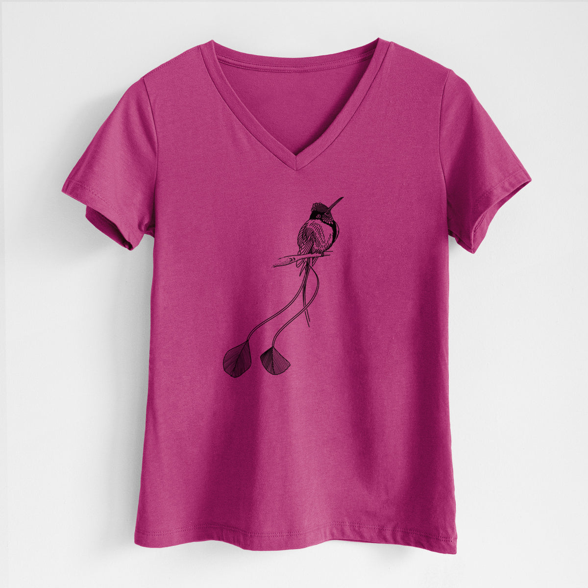 Berry pink women's relaxed fit cotton V-neck t-shirt laid flat, printed with a black ink illustration of a marvelous spatuletail hummingbird perched, with its two long racket-tipped tail feathers.