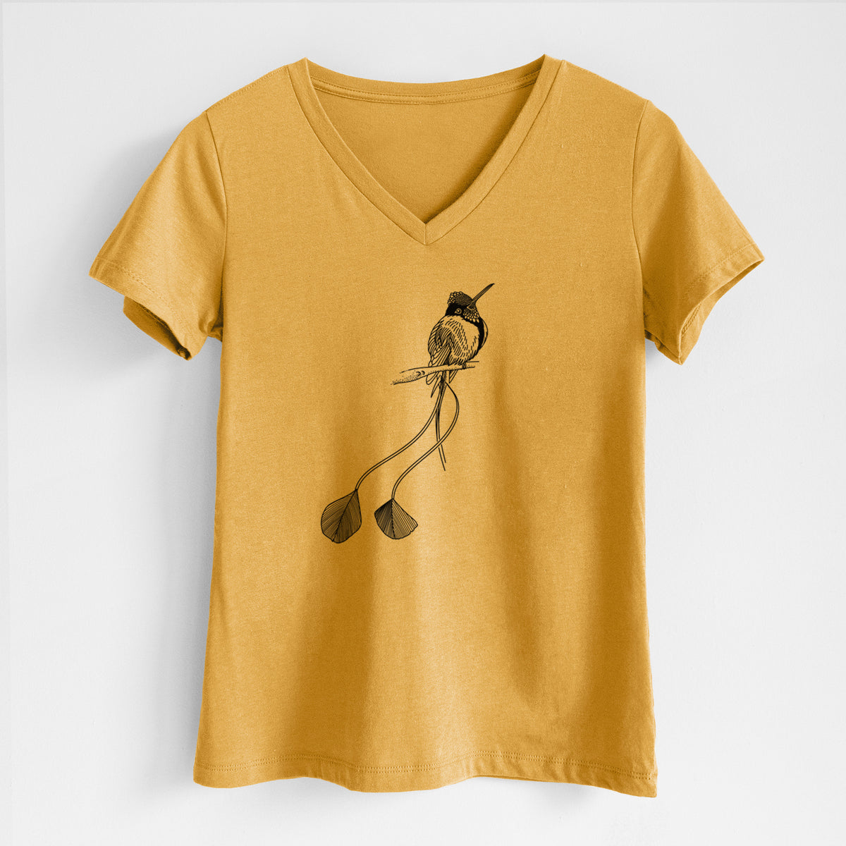 Honeycomb yellow women's relaxed fit cotton V-neck t-shirt laid flat, printed with a black ink illustration of a marvelous spatuletail hummingbird perched, with its two long racket-tipped tail feathers.