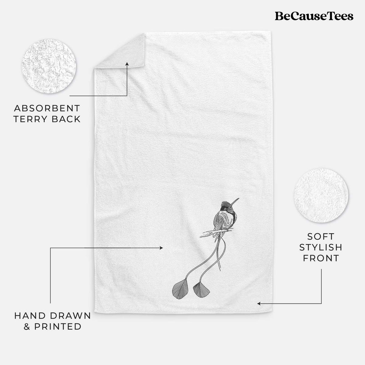 White hand towel printed with a black ink illustration of a marvelous spatuletail hummingbird perched, with its two long racket-tipped tail feathers.