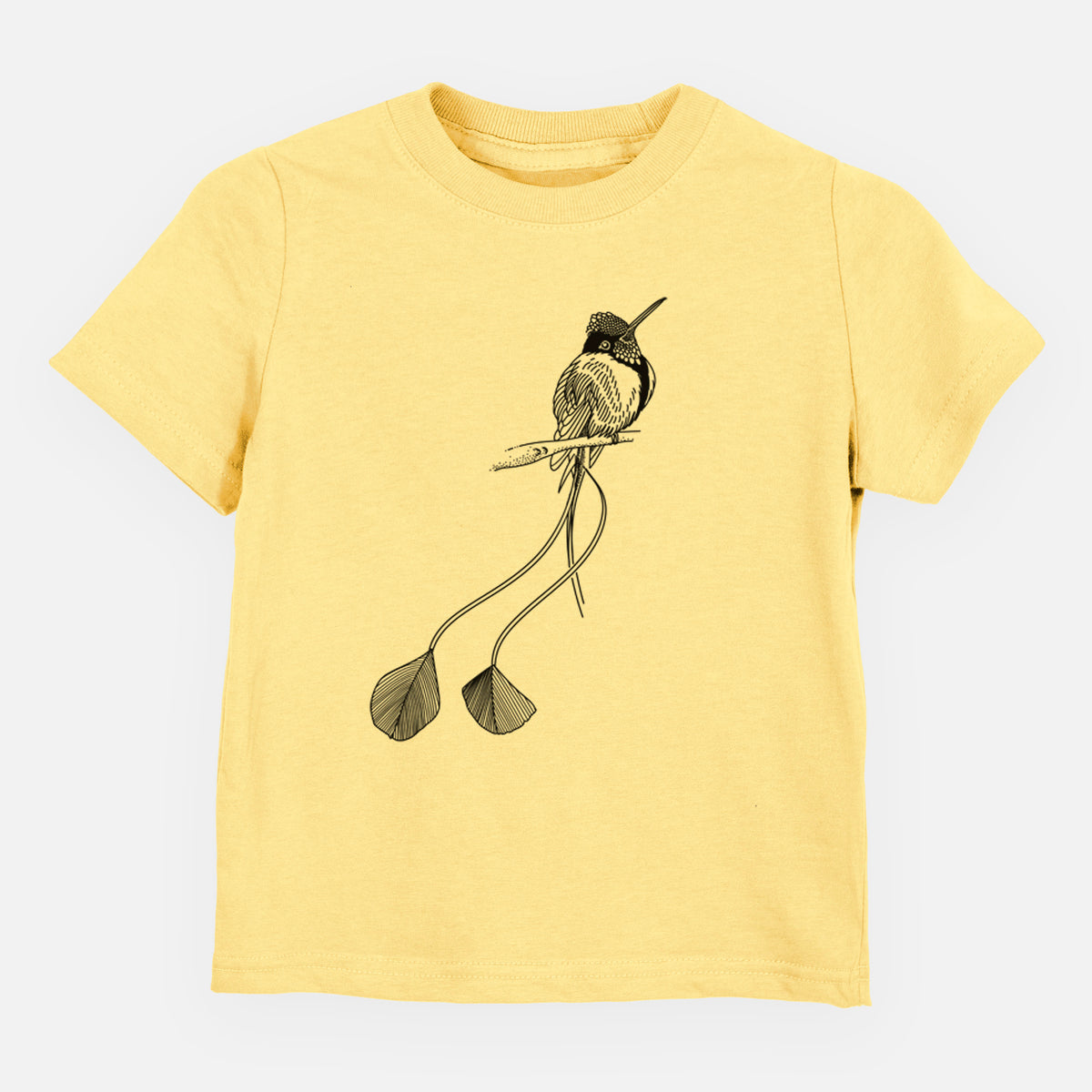 Butter yellow toddler t-shirt laid flat, printed with a black ink illustration of a marvelous spatuletail hummingbird perched, with its two long racket-tipped tail feathers.