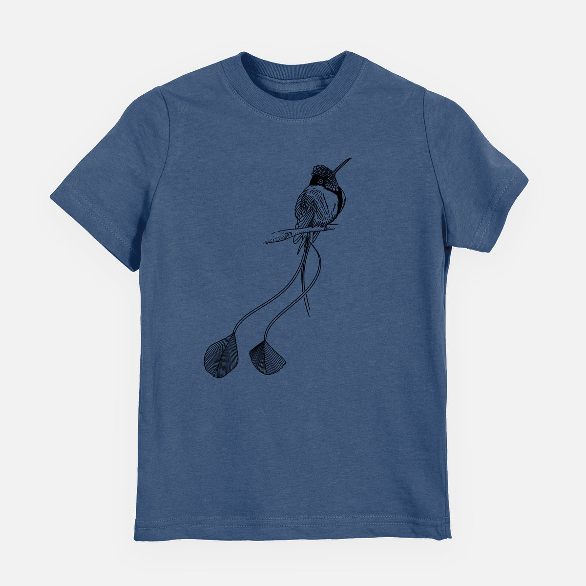 Indigo blue youth t-shirt laid flat, printed with a black ink illustration of a marvelous spatuletail hummingbird perched, with its two long racket-tipped tail feathers.