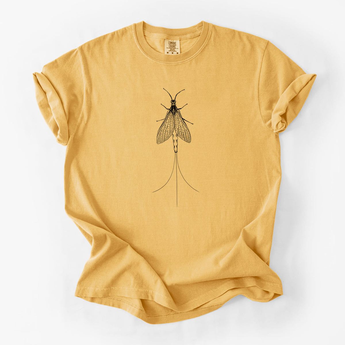 Golden wheat yellow Comfort Colors t-shirt laid flat, printed with a detailed black ink illustration of a mayfly with its wings raised and long tail filaments.