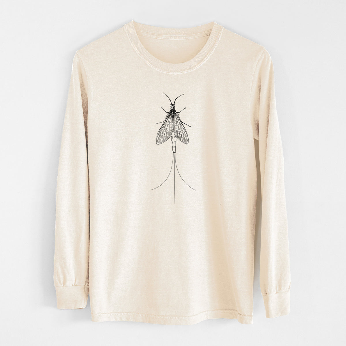 Ivory Comfort Colors long sleeve shirt laid flat, printed with a detailed black ink illustration of a mayfly with its wings raised and long tail filaments.