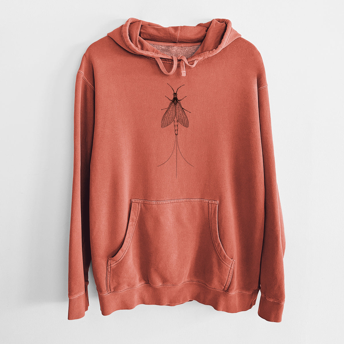 Amber orange pigment dyed hoodie laid flat, printed with a detailed black ink illustration of a mayfly with its wings raised and long tail filaments.