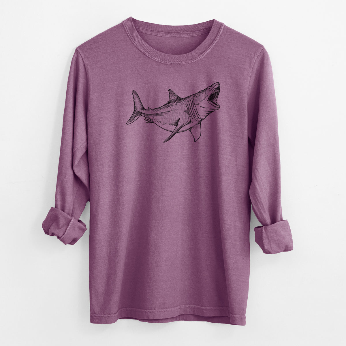 Berry pink Comfort Colors long sleeve shirt laid flat with the cuffs rolled, printed with a black ink illustration of a megalodon shark with its jaws open.