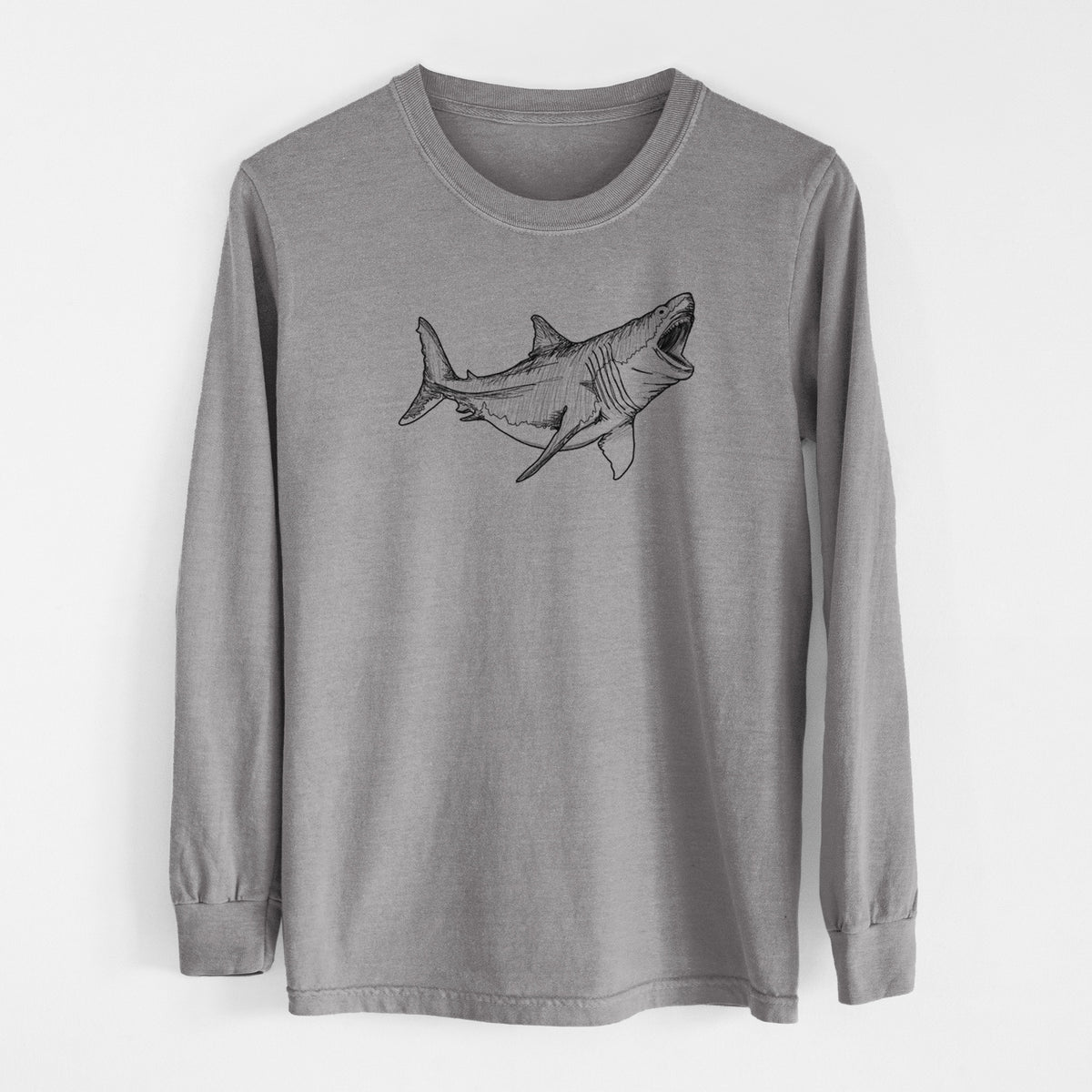 Grey Comfort Colors long sleeve shirt laid flat, printed with a black ink illustration of a megalodon shark with its jaws open.