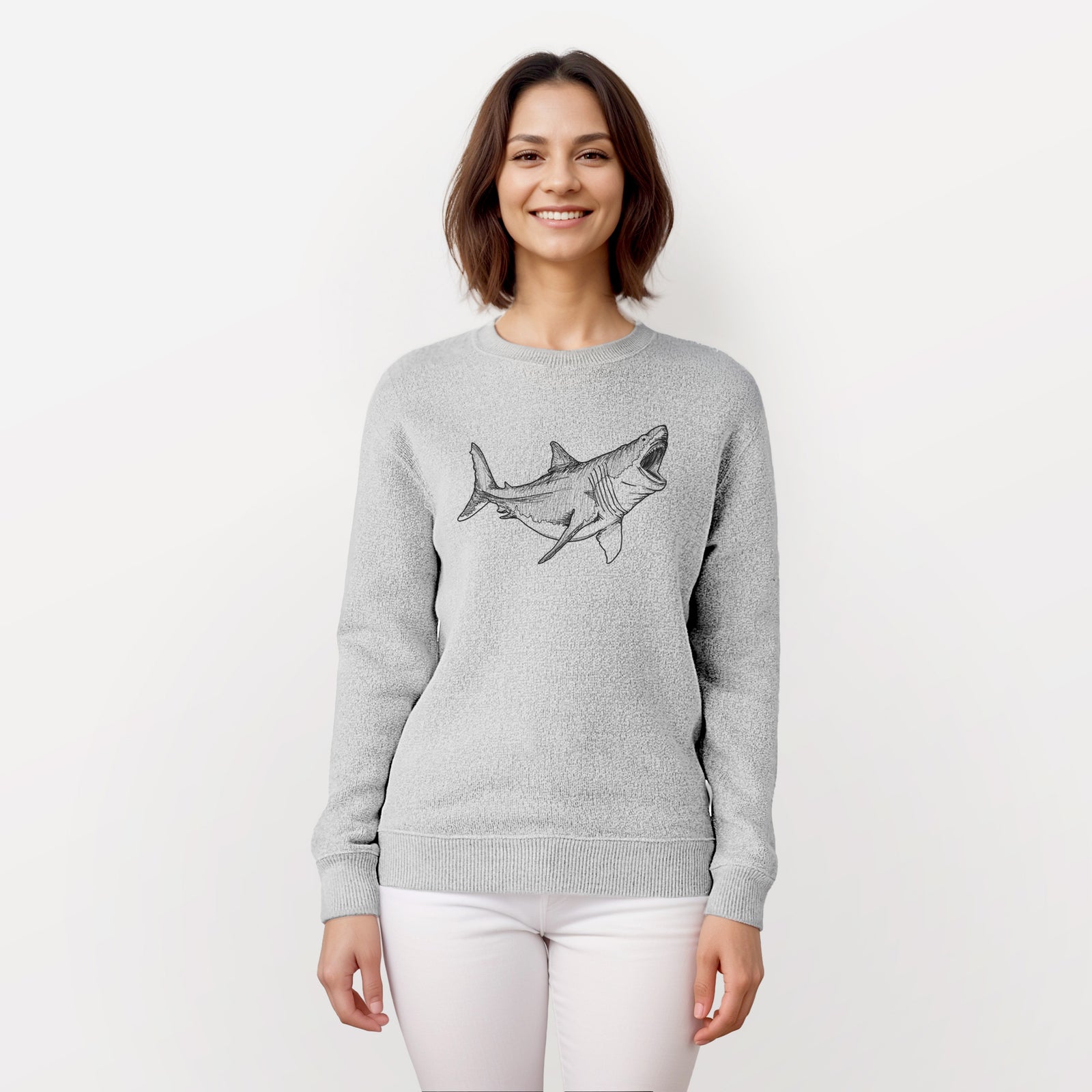 Salt and pepper knit sweatshirt laid flat, printed with a black ink illustration of a megalodon shark with its jaws open.
