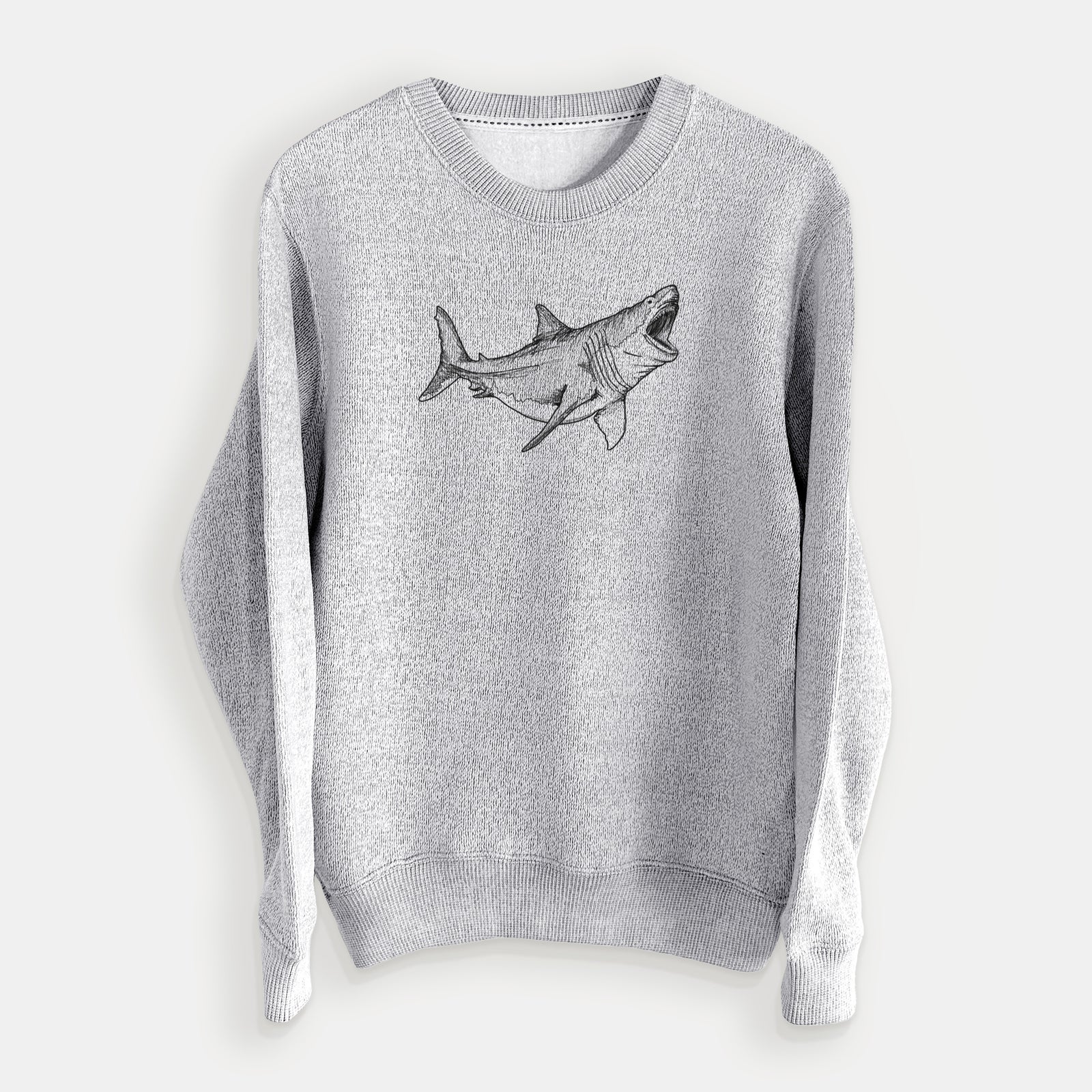 Salt and pepper knit sweatshirt laid flat, printed with a black ink illustration of a megalodon shark with its jaws open.
