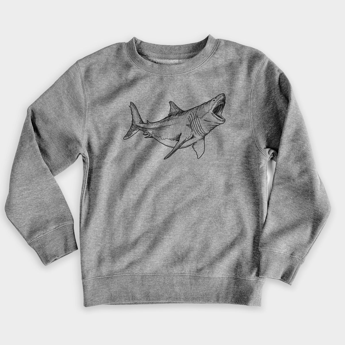 Nickel grey youth crewneck sweatshirt laid flat, printed with a black ink illustration of a megalodon shark with its jaws open.