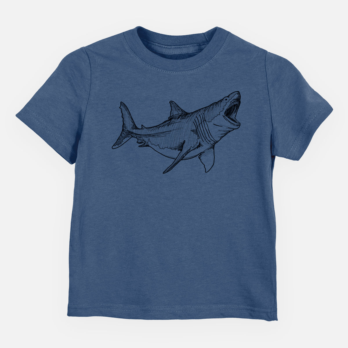 Indigo blue toddler t-shirt laid flat, printed with a black ink illustration of a megalodon shark with its jaws open.