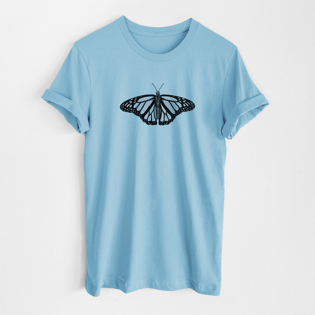 Ocean blue lightweight cotton t-shirt laid flat, printed with a detailed black ink illustration of a monarch butterfly with its wings spread.