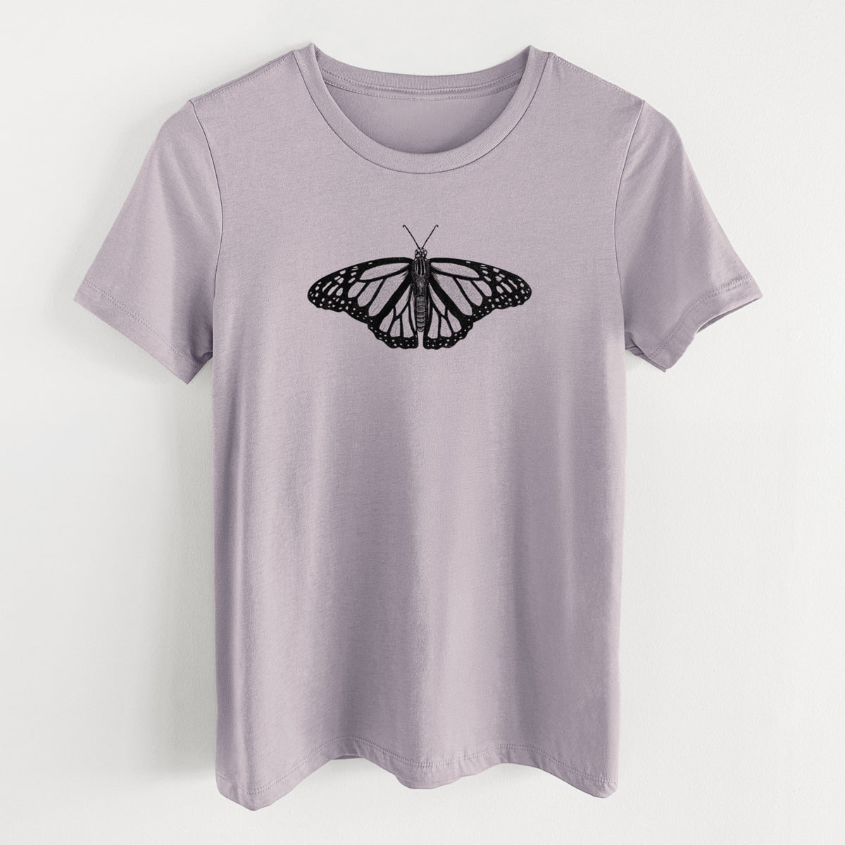 Light violet women's relaxed fit cotton t-shirt laid flat, printed with a detailed black ink illustration of a monarch butterfly with its wings spread.