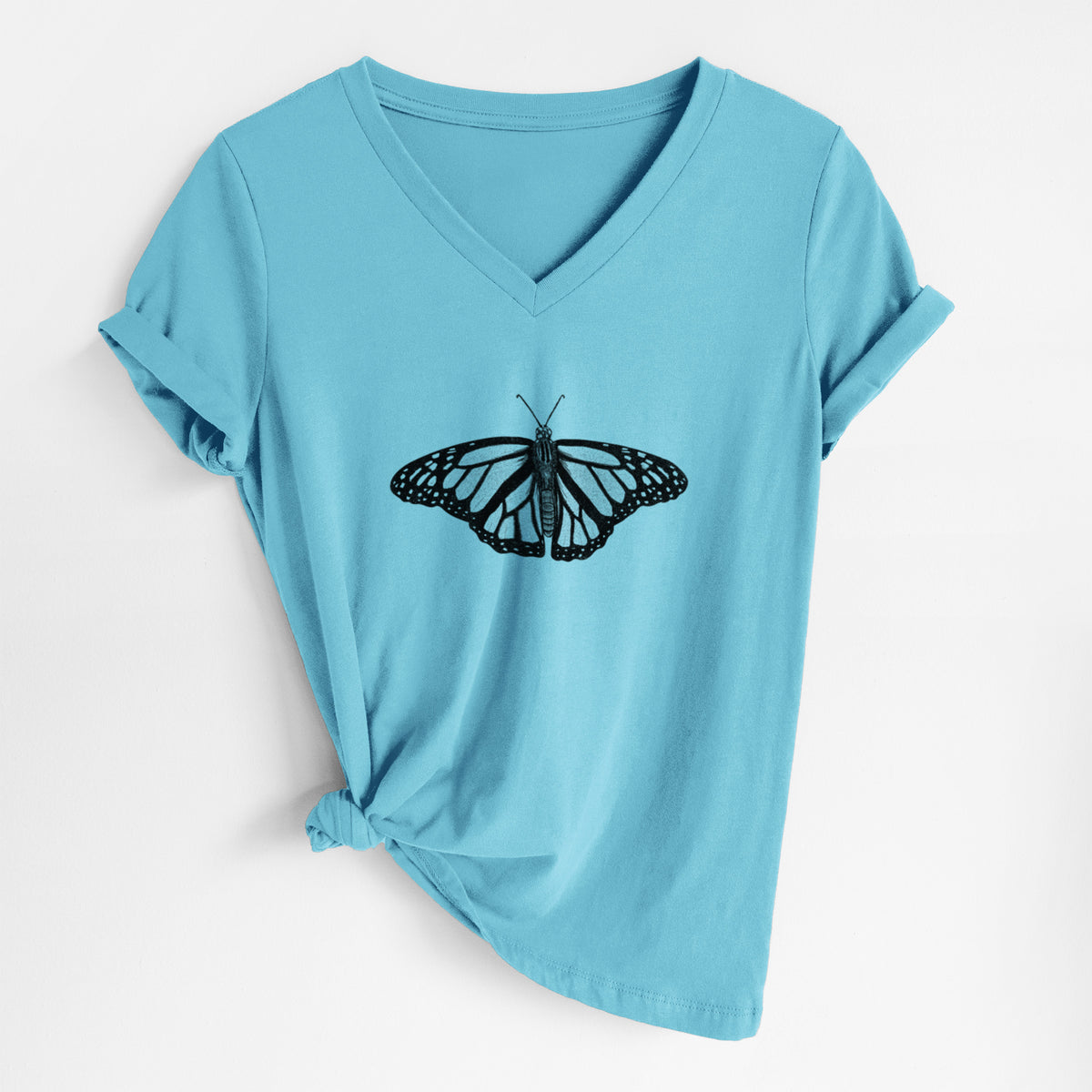 Turquoise women's relaxed fit cotton V-neck t-shirt laid flat, printed with a detailed black ink illustration of a monarch butterfly with its wings spread.