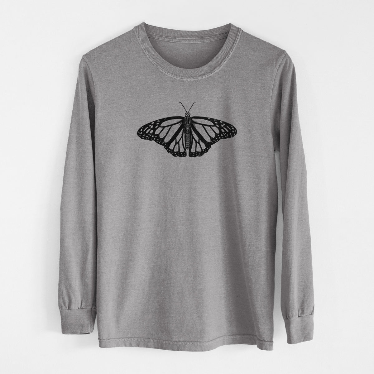 Grey Comfort Colors long sleeve shirt laid flat, printed with a detailed black ink illustration of a monarch butterfly with its wings spread.