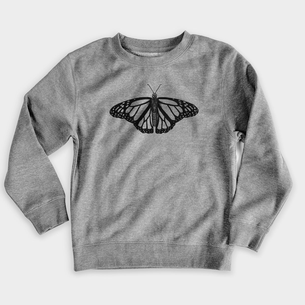 Nickel grey youth crewneck sweatshirt laid flat, printed with a detailed black ink illustration of a monarch butterfly with its wings spread.
