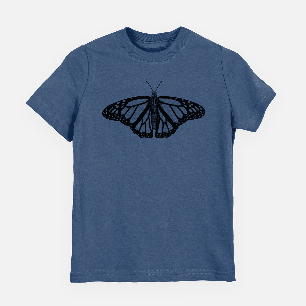 Indigo blue youth t-shirt laid flat, printed with a detailed black ink illustration of a monarch butterfly with its wings spread.