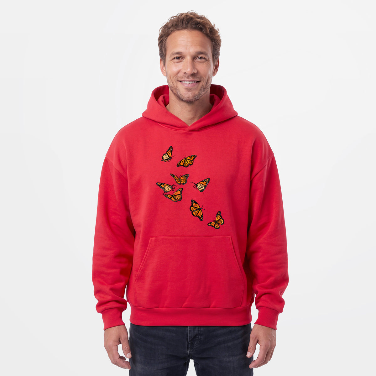 Male model wearing the Monarch Migration - Statement Midweight Hoodie.