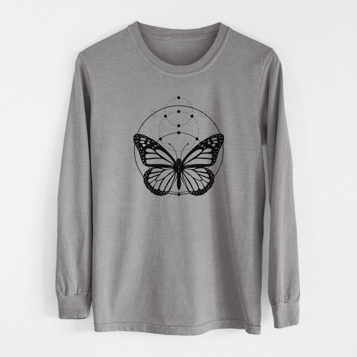 Grey Comfort Colors long sleeve shirt laid flat, printed with a black ink monarch butterfly inside a circle, beneath a line of moon phases.