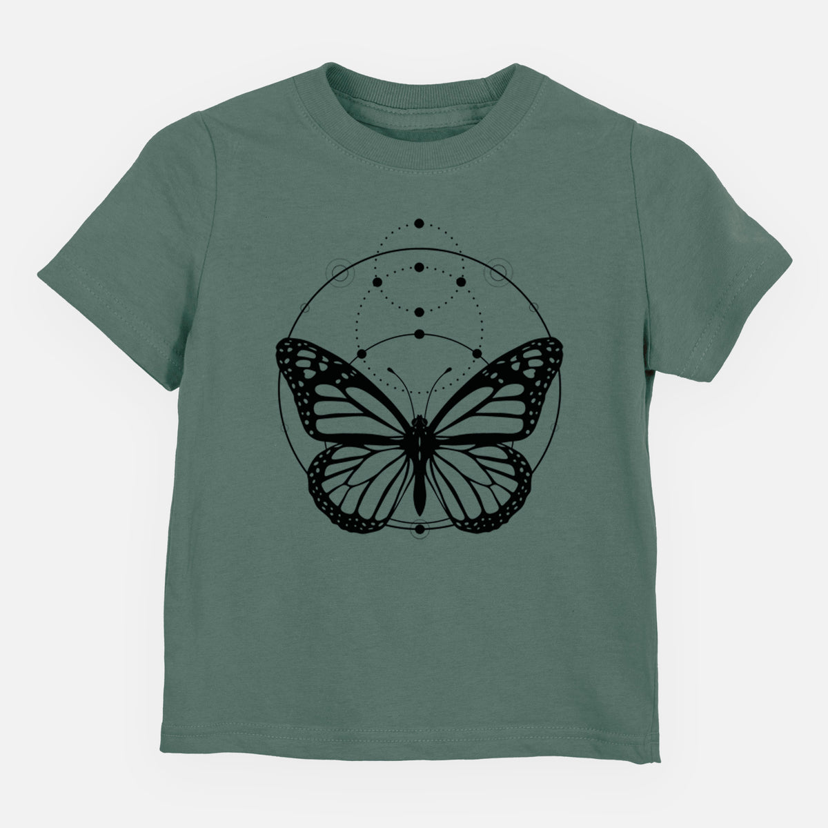 Basil green toddler t-shirt laid flat, printed with a black ink monarch butterfly inside a circle, beneath a line of moon phases.