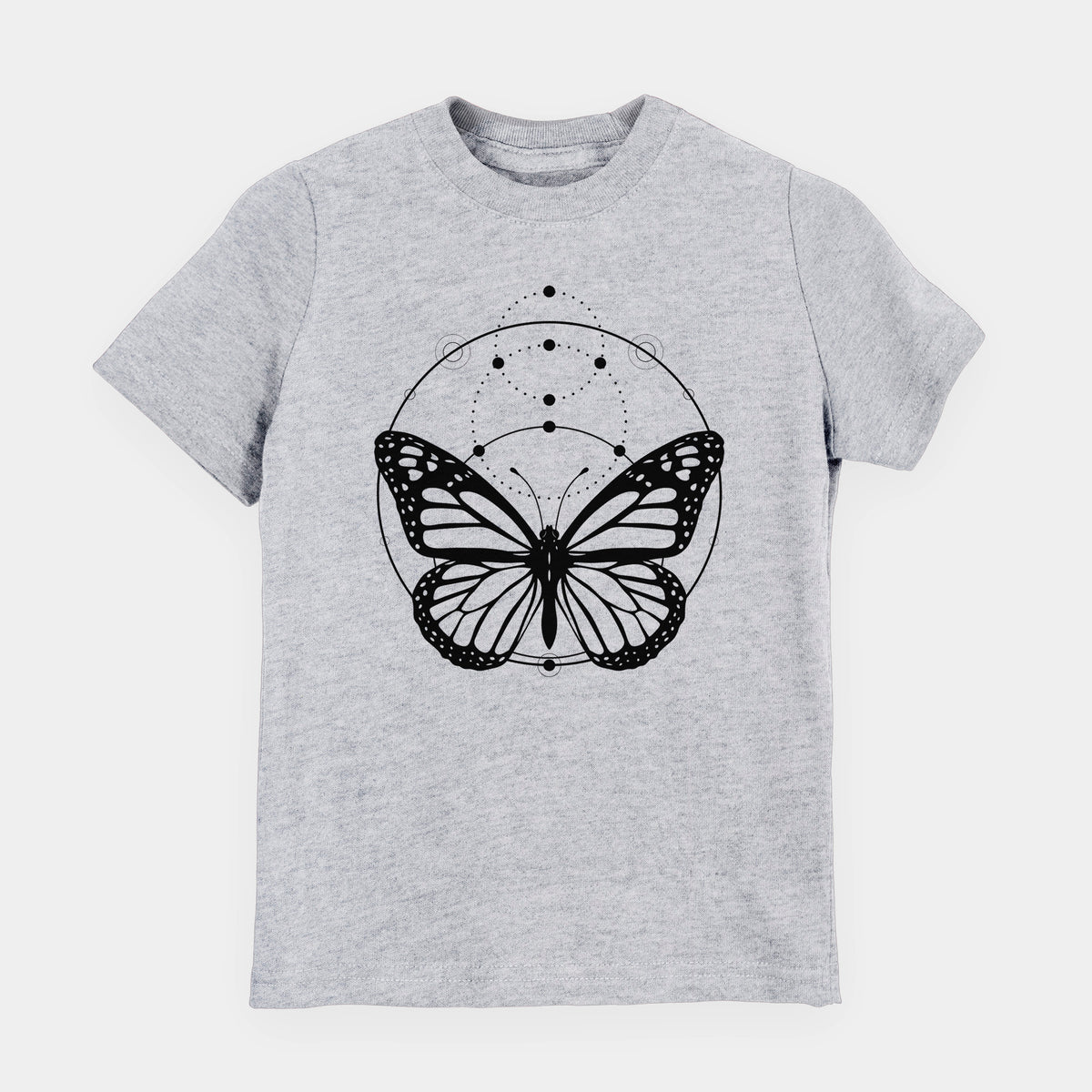 Heather grey youth t-shirt laid flat, printed with a black ink monarch butterfly inside a circle, beneath a line of moon phases.