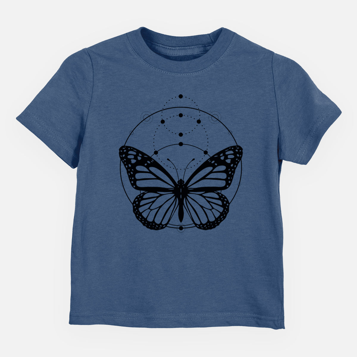Indigo blue toddler t-shirt laid flat, printed with a black ink monarch butterfly inside a circle, beneath a line of moon phases.