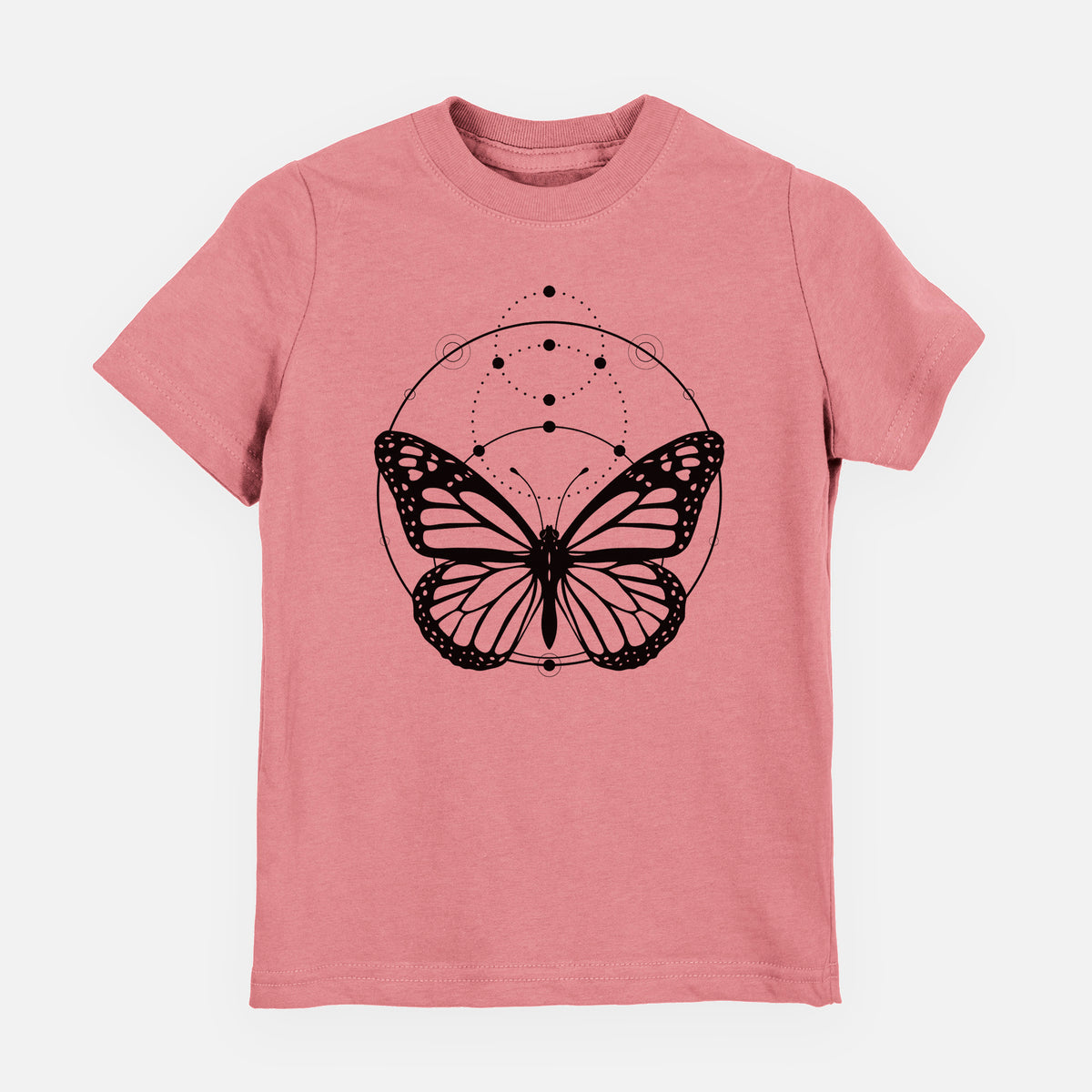Mauve pink youth t-shirt laid flat, printed with a black ink monarch butterfly inside a circle, beneath a line of moon phases.