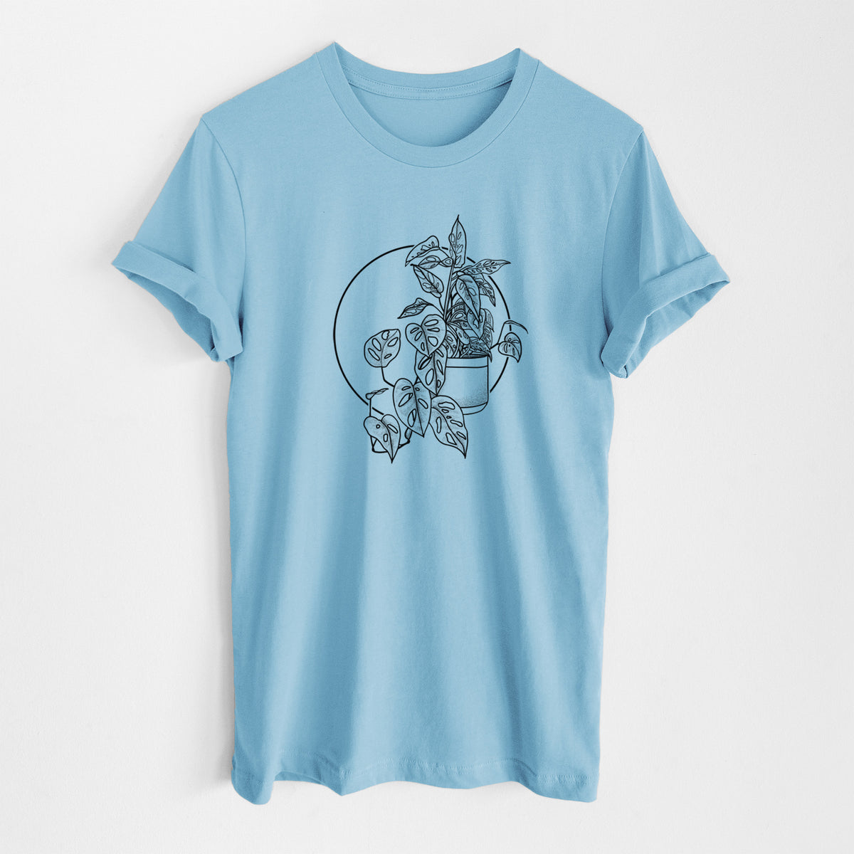 Ocean blue lightweight cotton t-shirt laid flat, printed with a black ink illustration of a potted Monsteradansonii plant with trailing vines in front of a circle.