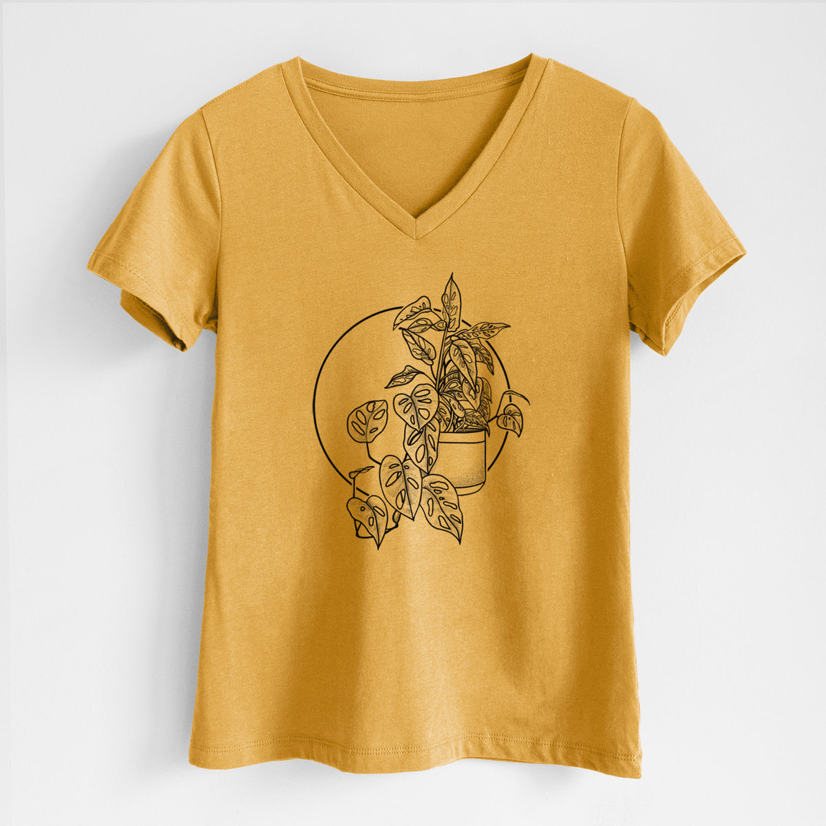 Honeycomb yellow women's relaxed fit cotton V-neck t-shirt laid flat, printed with a black ink illustration of a potted Monsteradansonii plant with trailing vines in front of a circle.