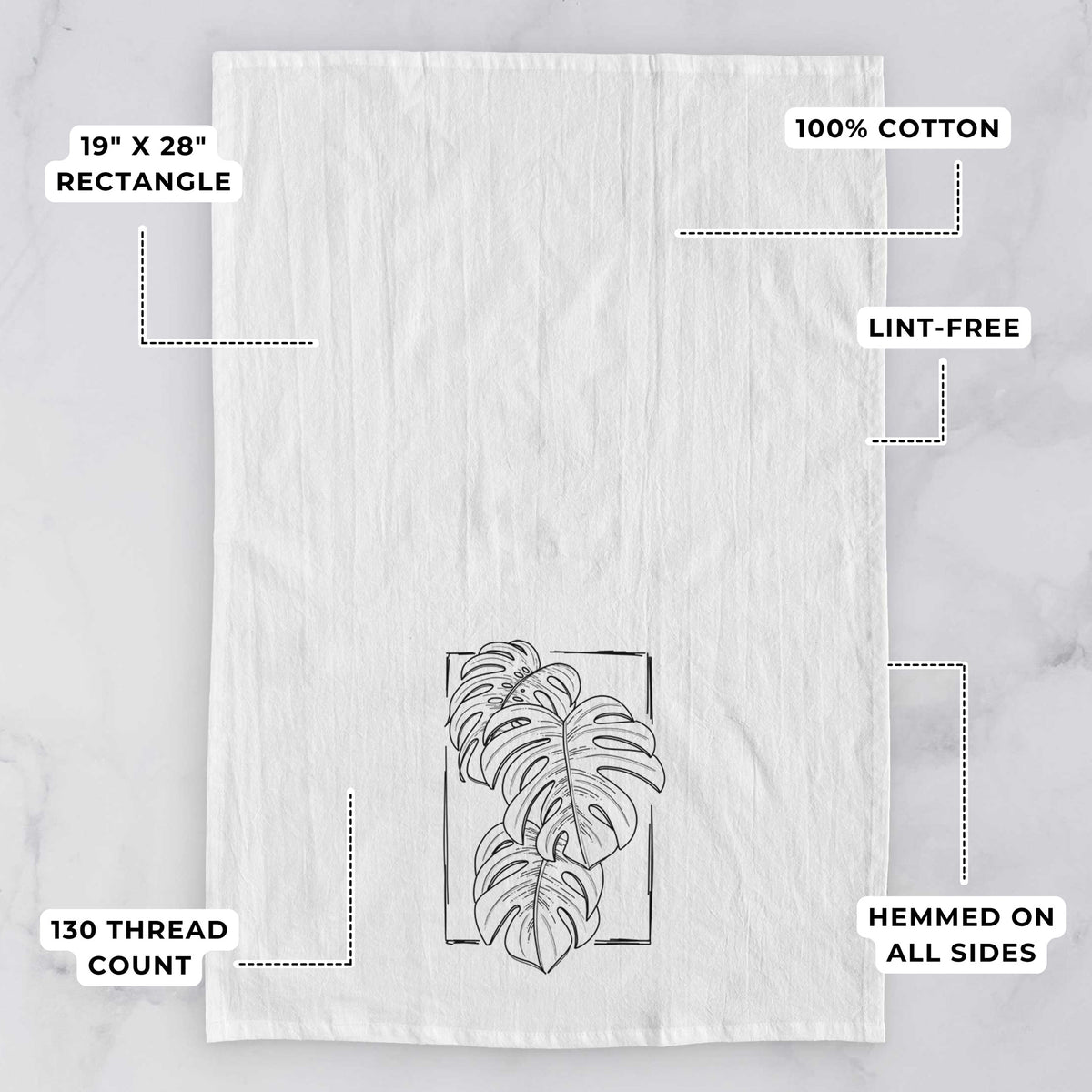 White tea towel printed with a black ink line drawing of Monstera deliciosa leaves inside a rectangle outline, with feature labels: 19 by 28 inch rectangle, 100% cotton, lint-free, 130 thread count, hemmed on all sides.