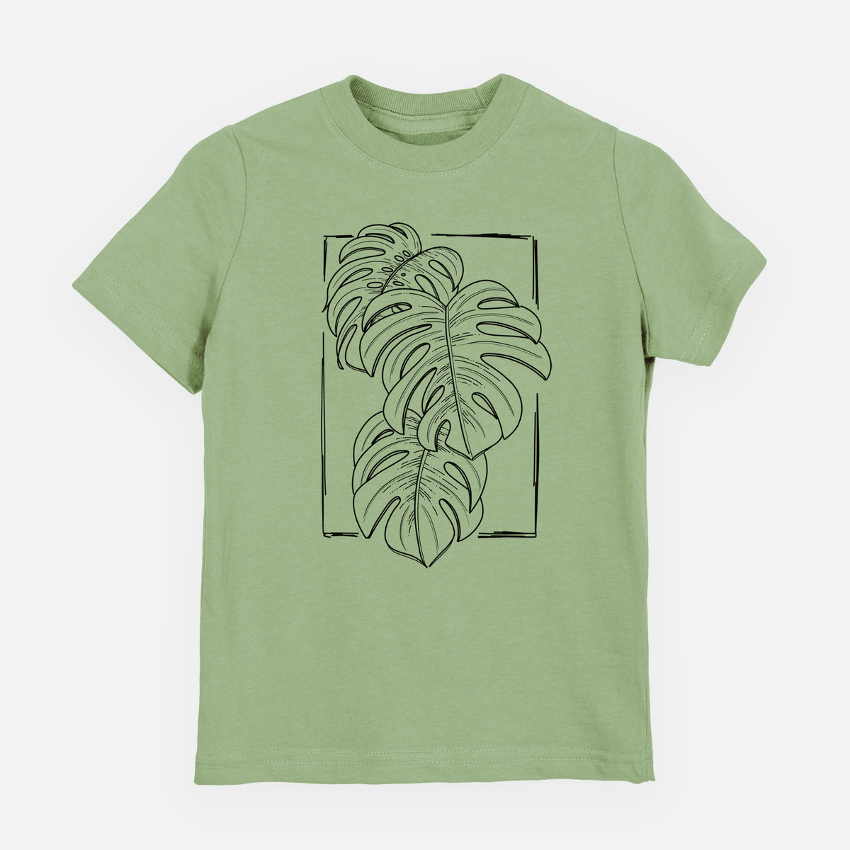 Sage green youth t-shirt laid flat, printed with a black ink line drawing of Monstera deliciosa leaves inside a rectangle outline.