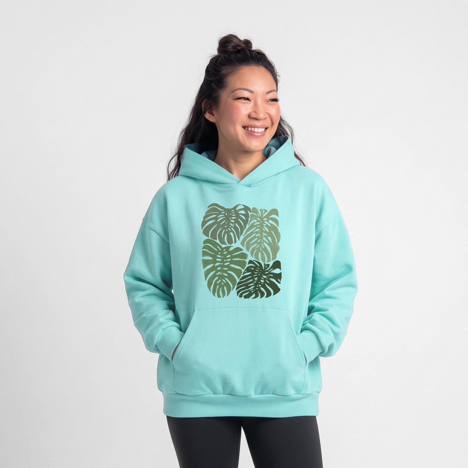 Monstera Vibes - Statement Midweight Hoodie in Violet, laid flat, showing the oversized boxy fit and front kangaroo pocket.