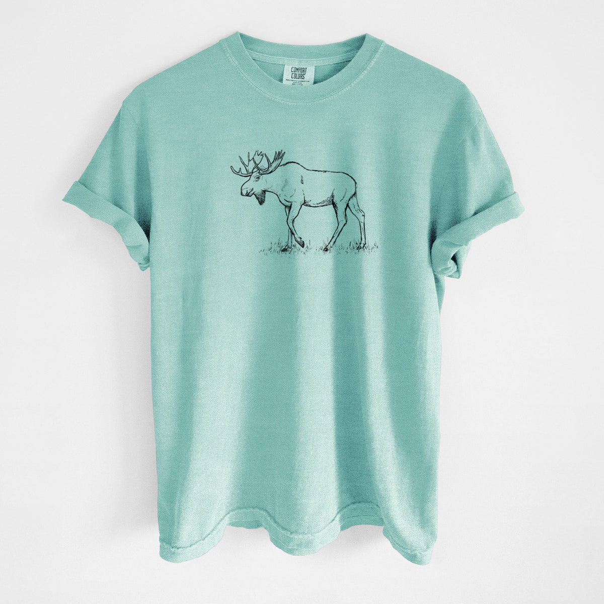 Chalky mint Comfort Colors t-shirt laid flat, printed with a black ink illustration of a bull moose with broad antlers walking.