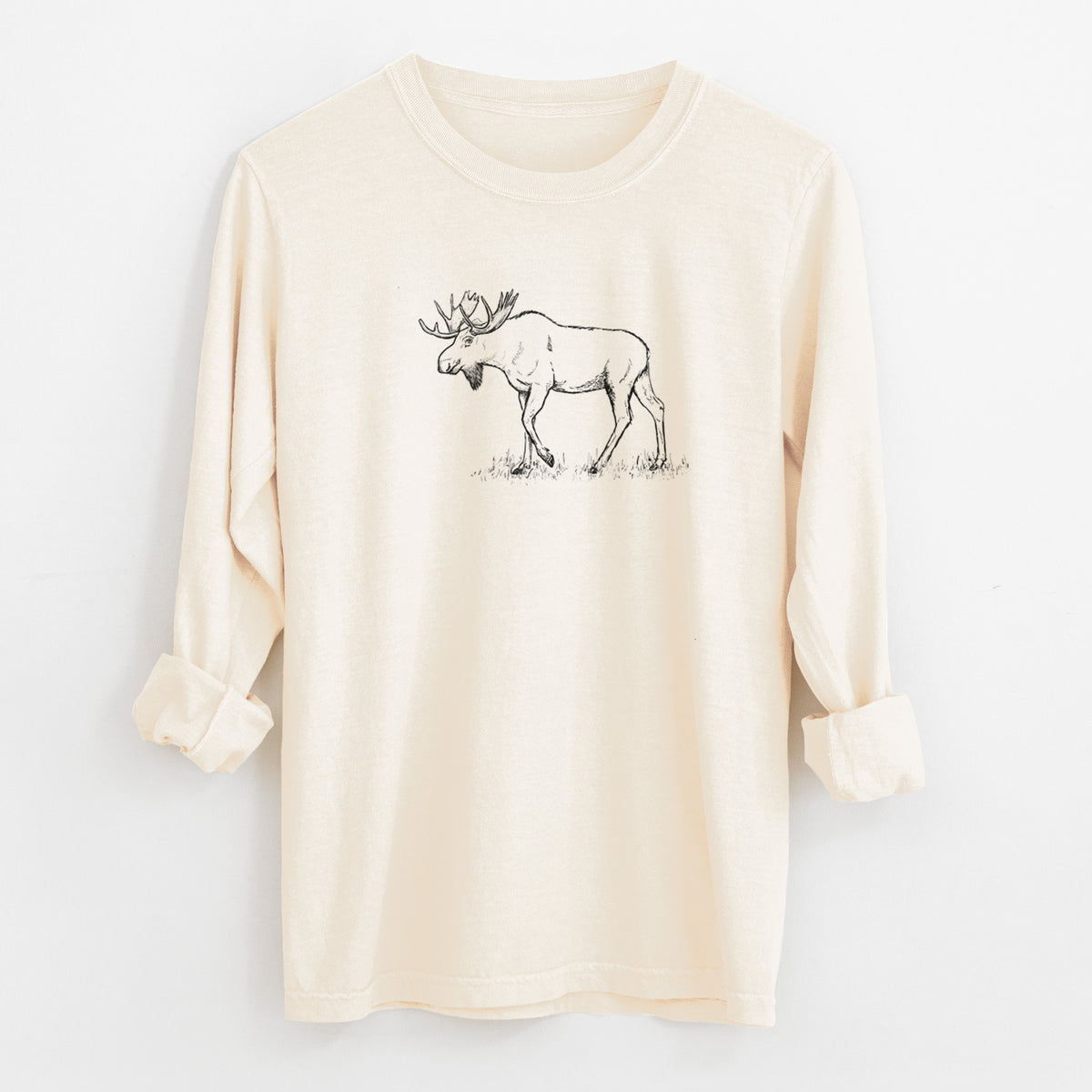 Ivory Comfort Colors long sleeve shirt laid flat with the cuffs rolled, printed with a black ink illustration of a bull moose with broad antlers walking.