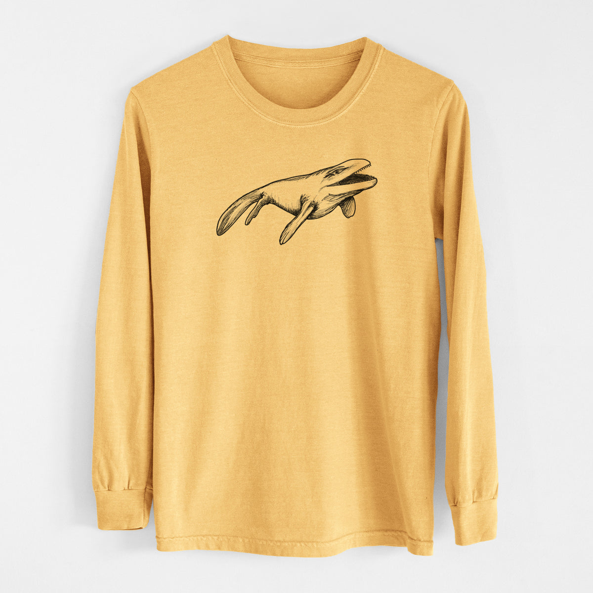 Golden wheat yellow Comfort Colors long sleeve shirt laid flat, printed with a black ink illustration of a Mosasaur swimming.
