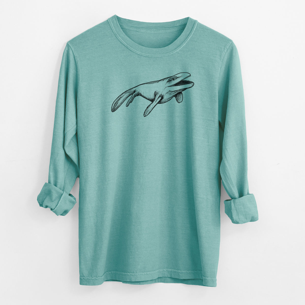 Reef green Comfort Colors long sleeve shirt laid flat with the cuffs rolled, printed with a black ink illustration of a Mosasaur swimming.