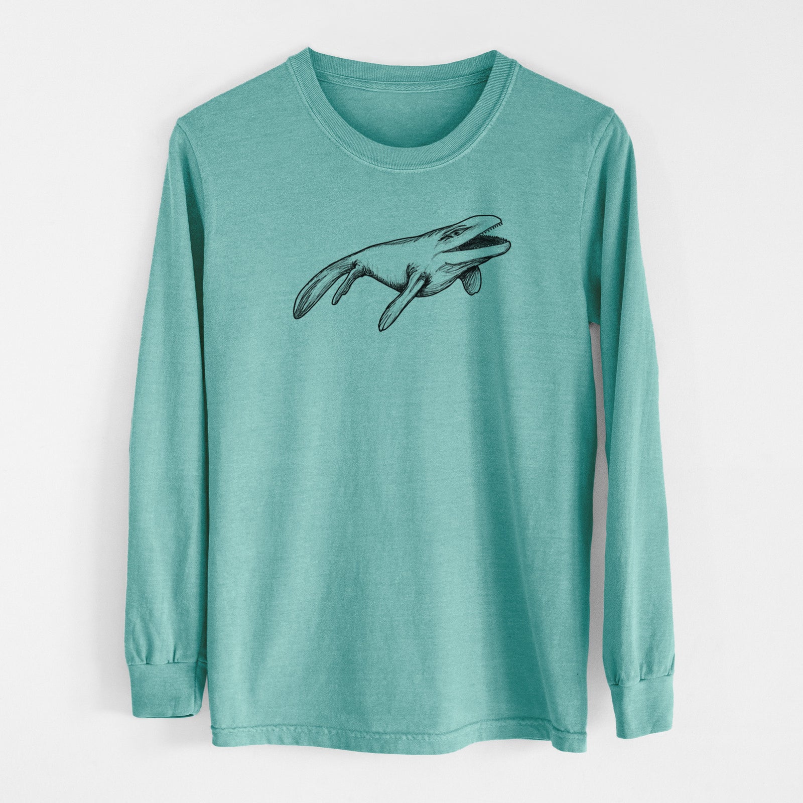 Reef green Comfort Colors long sleeve shirt laid flat, printed with a black ink illustration of a Mosasaur swimming.