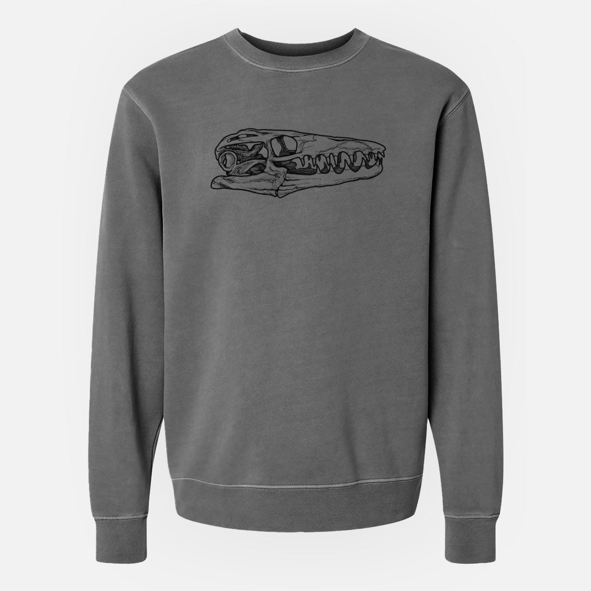 Faded black pigment dyed crewneck sweatshirt laid flat, printed with a detailed black ink illustration of a Mosasaur skull.