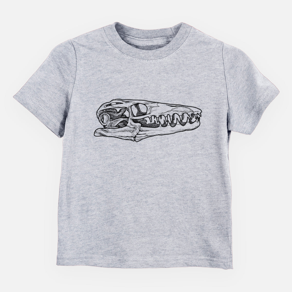Heather grey toddler t-shirt laid flat, printed with a detailed black ink illustration of a Mosasaur skull.